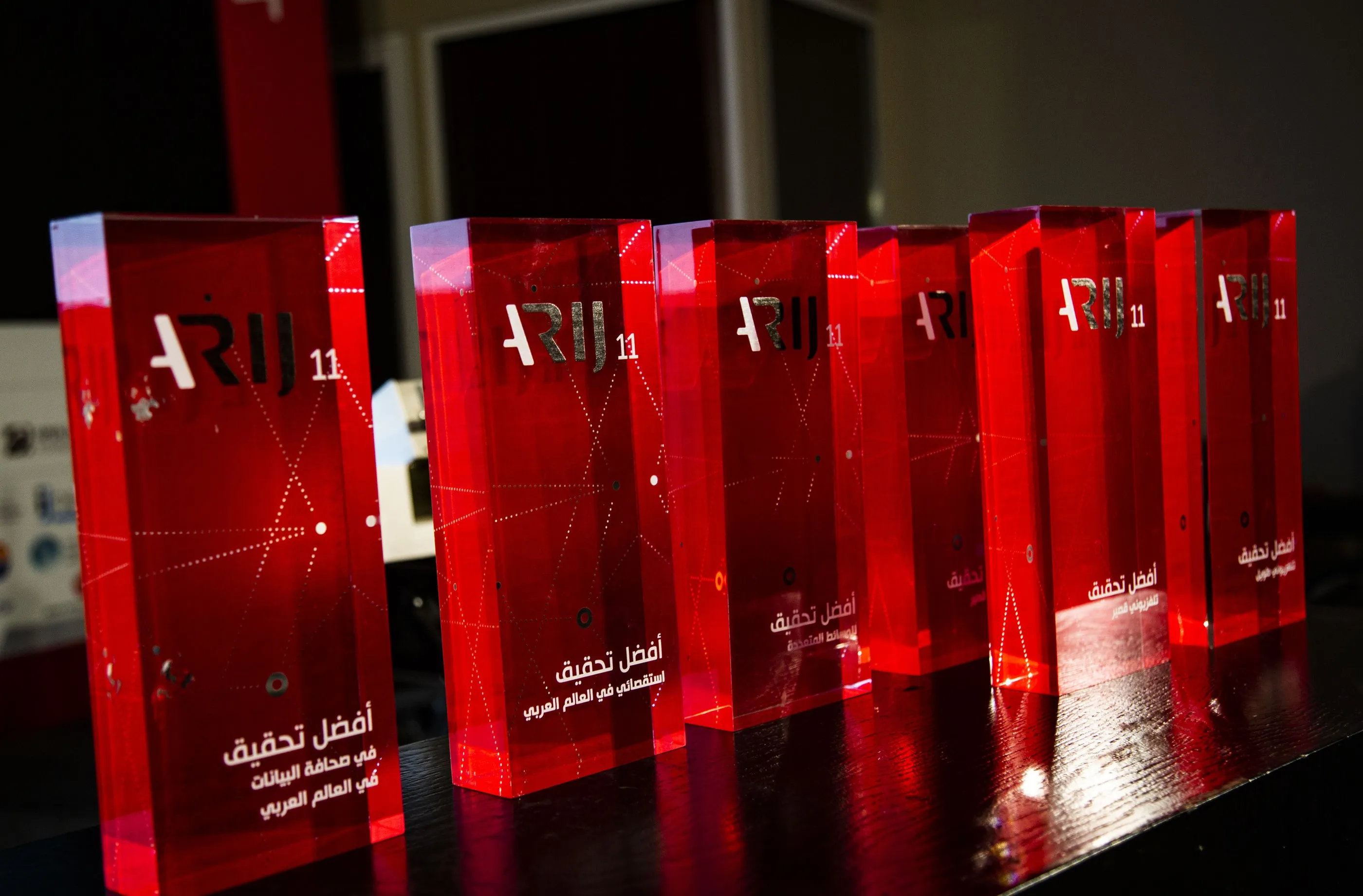 Red acrylic ARIJ award trophies