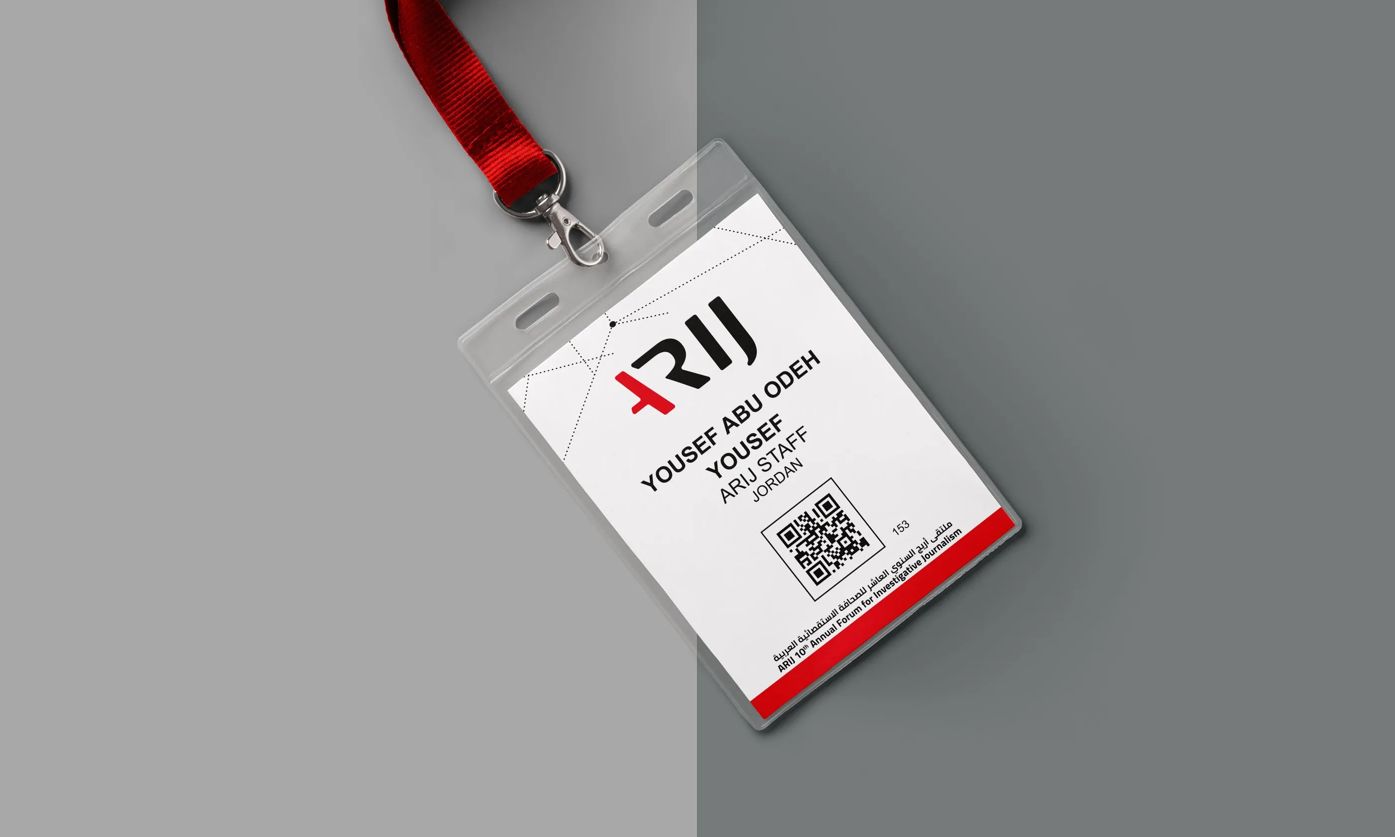 ARIJ conference badge on a red lanyard