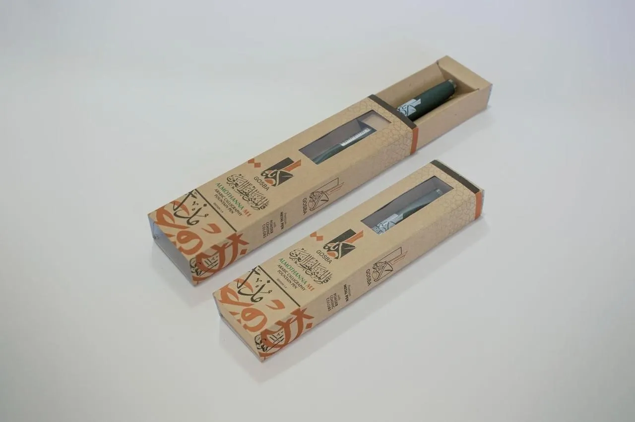Almothanna M100 pen sleeves in kraft board, one open to show the pen
